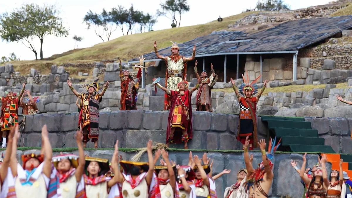 Hands holding printed Inti Raymi itinerary and reservation confirmation
